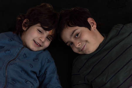 two brothers showing affection for each other