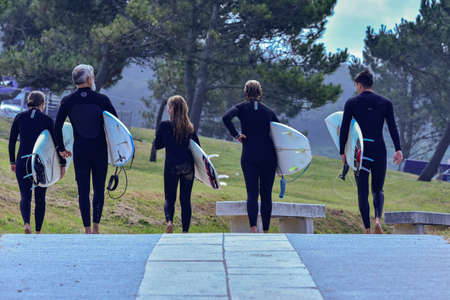 Spain 13 August 2021 Pantin group of surfers leave the beach