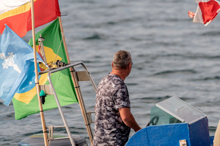 vigo bay, pontevedra , spain, july 16, 2022: ships on traditional procession maritime seafarersのeditorial素材