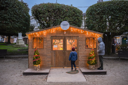 lugo, spain. December 10, 2022: activities and Christmas market in the park with traditional games for children and adultsのeditorial素材
