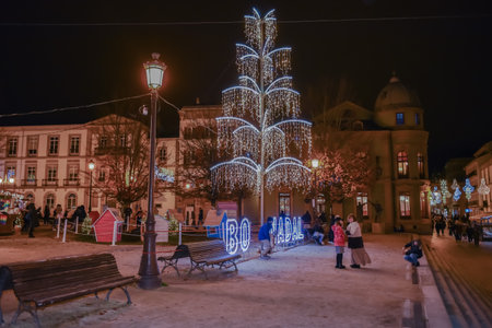 lugo, spain. December 9, 2022: activities and Christmas market in the park with traditional games for children and adultsのeditorial素材