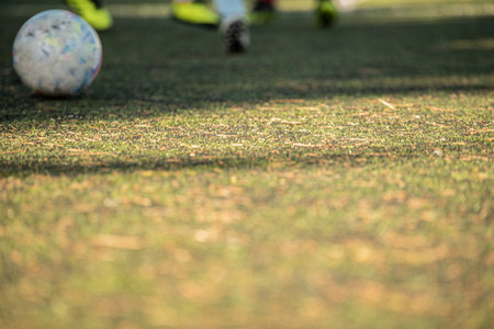 stock image kid game football. difocused imageの写真素材