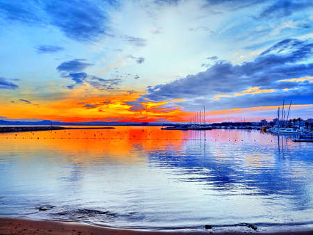 Sunset over the marina in Alghero, Sardinia