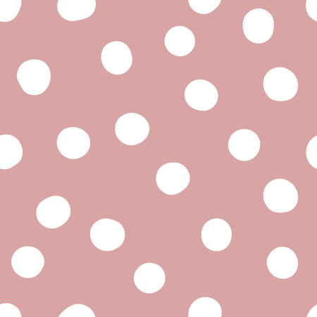 Seamless neutral polka dots pattern. White hand-drawn circles on dusty pink background. Abstract Random points ornament. Vector rose illustration for wallpaper, fabric, print, wrapping paper, textileのイラスト素材