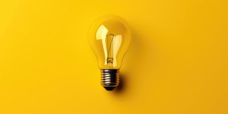 Yellow light bulb on yellow background. Minimal idea concept. 3D Renderingの素材