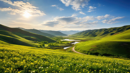 a green hills with yellow flowers and a riverの素材