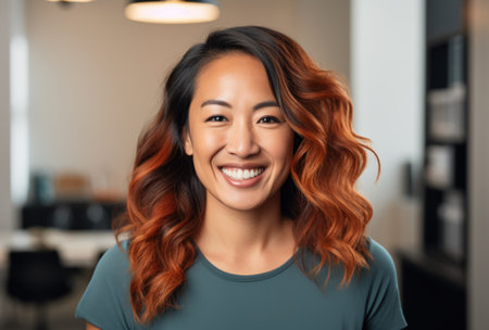 a woman smiling at cameraの素材