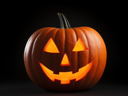 a pumpkin with a face carved out of itの素材