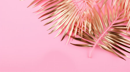 a pink and gold palm leavesの素材