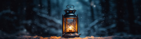 Vintage lantern glowing in a snowy winter nightの素材