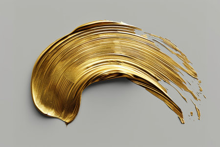 Golden paint splash on a gray backgroundの素材