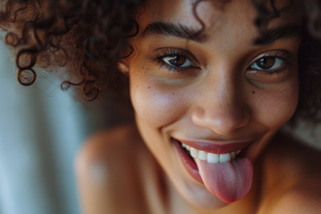 Smiling woman with curly hairの素材