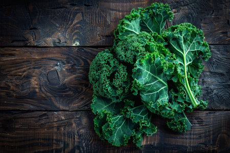 Fresh green kale leaves on rustic wooden backgroundの素材