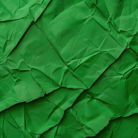 Crumpled green paper texture backgroundの素材