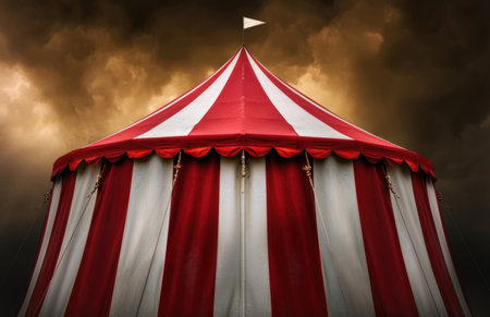 Dramatic circus tent against stormy skyの素材