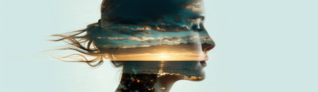 woman silhouette against sunset skyの素材