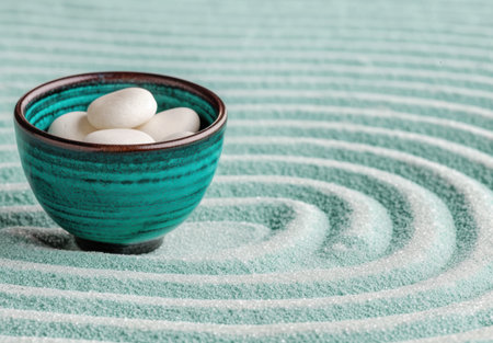 Ceramic bowl with white eggs on a textured green backgroundの素材