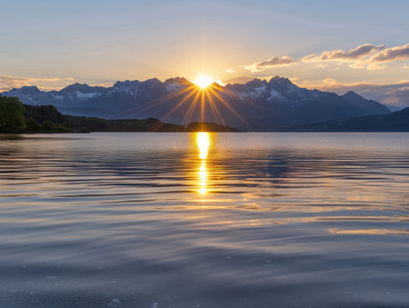 Stunning sunset over a serene mountain lakeの素材