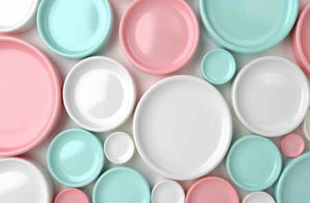 Assortment of pastel-colored ceramic plates and bowlsの素材