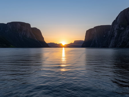 Serene sunset over majestic fjordの素材