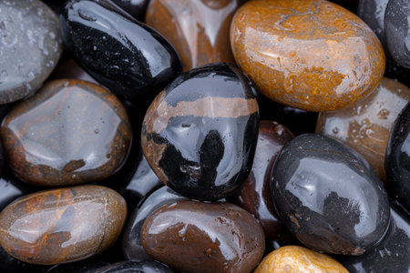 Closeup of colorful natural stones and pebblesの素材