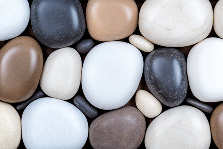 Assorted smooth river rocks and pebblesの素材