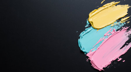 Colorful abstract paint strokes on black backgroundの素材