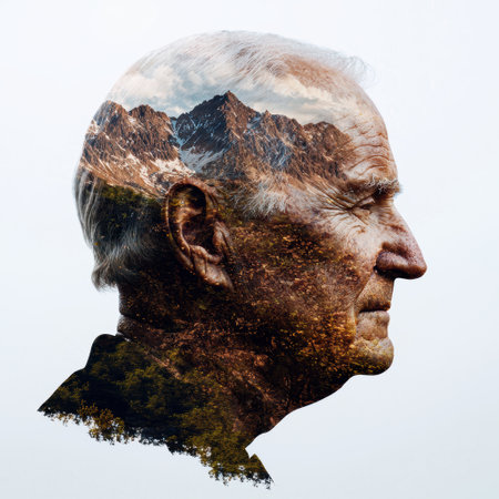 man's face merged with mountain landscapeの素材