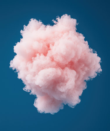 Vibrant pink cloud against a deep blue skyの素材