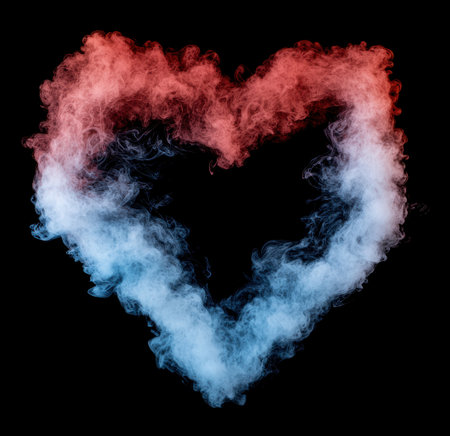 heart-shaped smoke cloud against black backgroundの素材