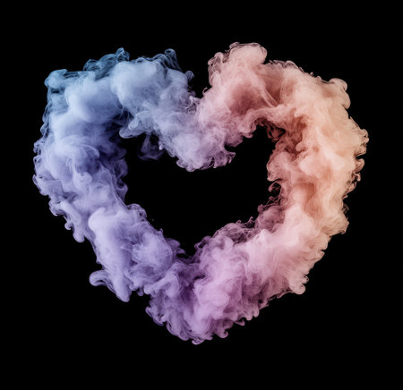 Colorful smoke heart shape on black backgroundの素材