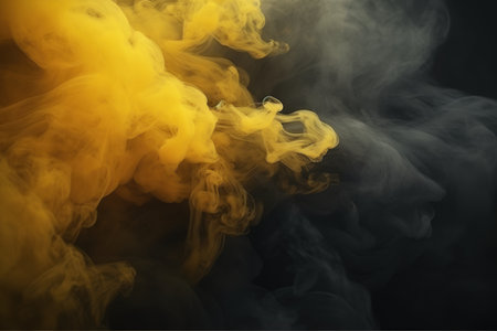 Swirling yellow smoke on black backgroundの素材