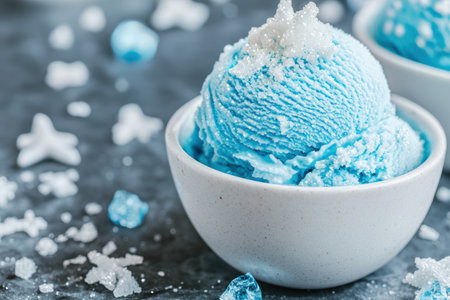 Icy blue ice cream scoop in a bowlの素材