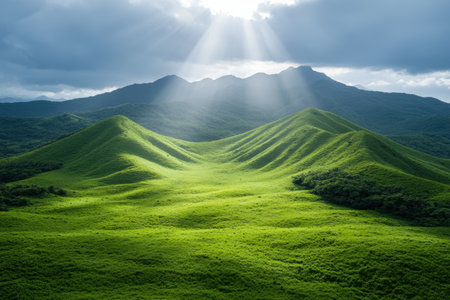 Dramatic mountain landscape with sunbeamsの素材