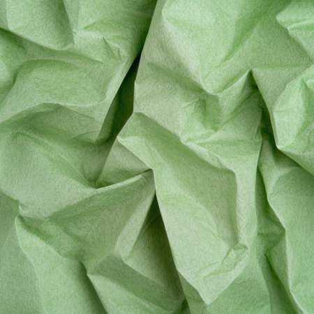 Crumpled green paper texture backgroundの素材