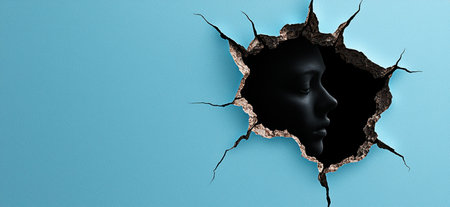 Cracked wall revealing dark silhouetteの素材