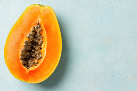 Sliced papaya on a blue backgroundの素材