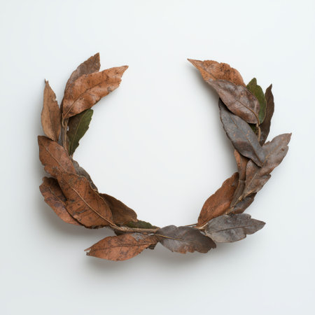 Autumn leaves wreath on white backgroundの素材
