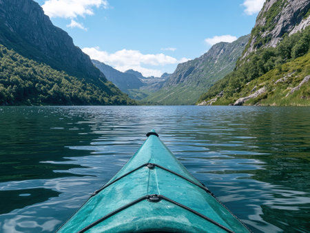 Kayaking through serene mountain lakeの素材