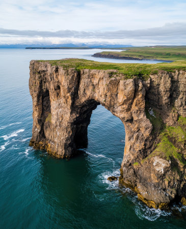 Dramatic coastal landscape with rocky arch formationの素材