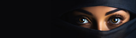 mysterious woman's eyes peering through veilの素材
