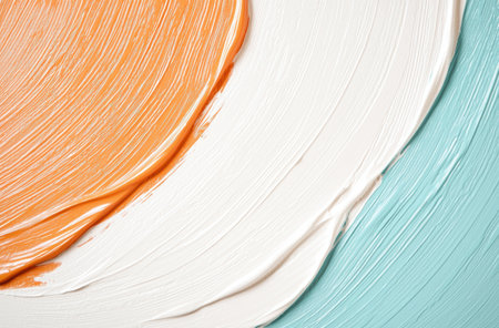 abstract paint brushstrokes in orange and whiteの素材