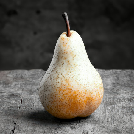 Ripe pear on wooden surfaceの素材
