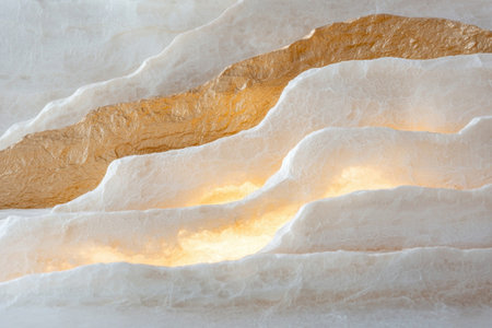 Textured stone surface with warm lightingの素材