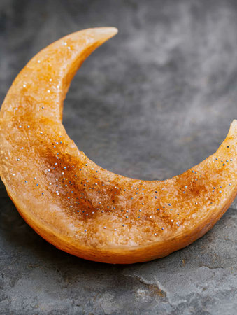 Closeup of a juicy orange slice with crystallized sugarの素材