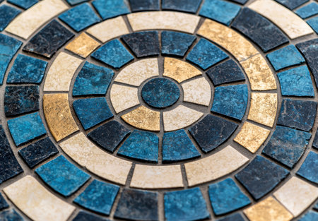 Intricate mosaic tile pattern in blue and gold tonesの素材