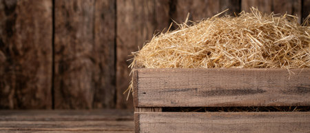 Wooden crate filled with strawの素材