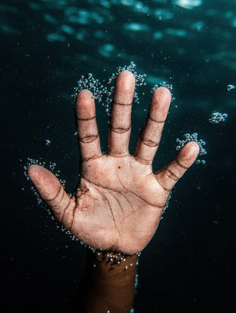 Underwater hand with bubblesの素材