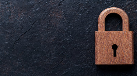 Wooden lock on dark backgroundの素材