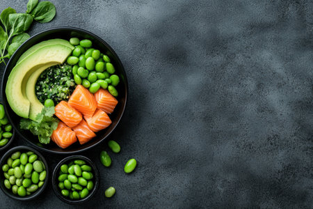 Delicious and healthy salmon poke bowl with avocado, edamame, and seaweed saladの素材